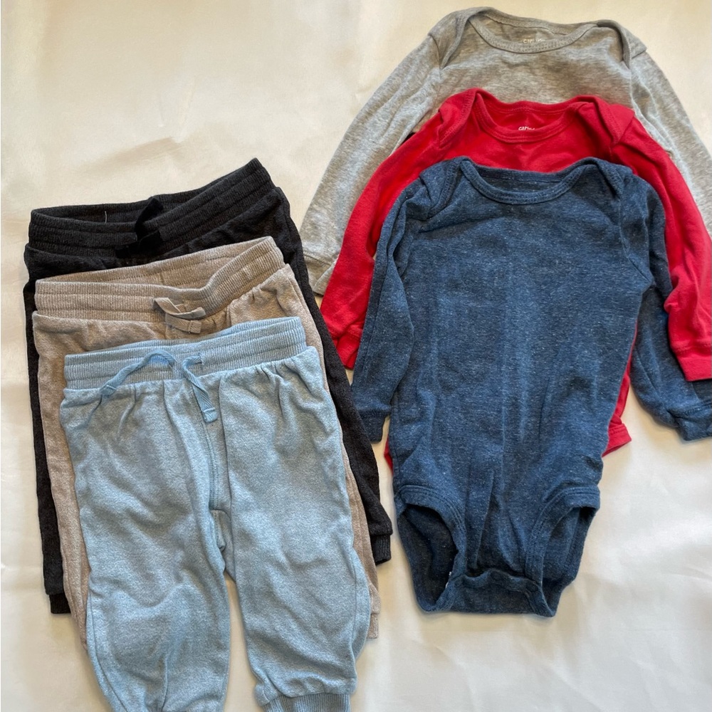 Lot of 9 month clothing. 3 long sleeve onesies (Carter’s) and 3 pants (H&M)